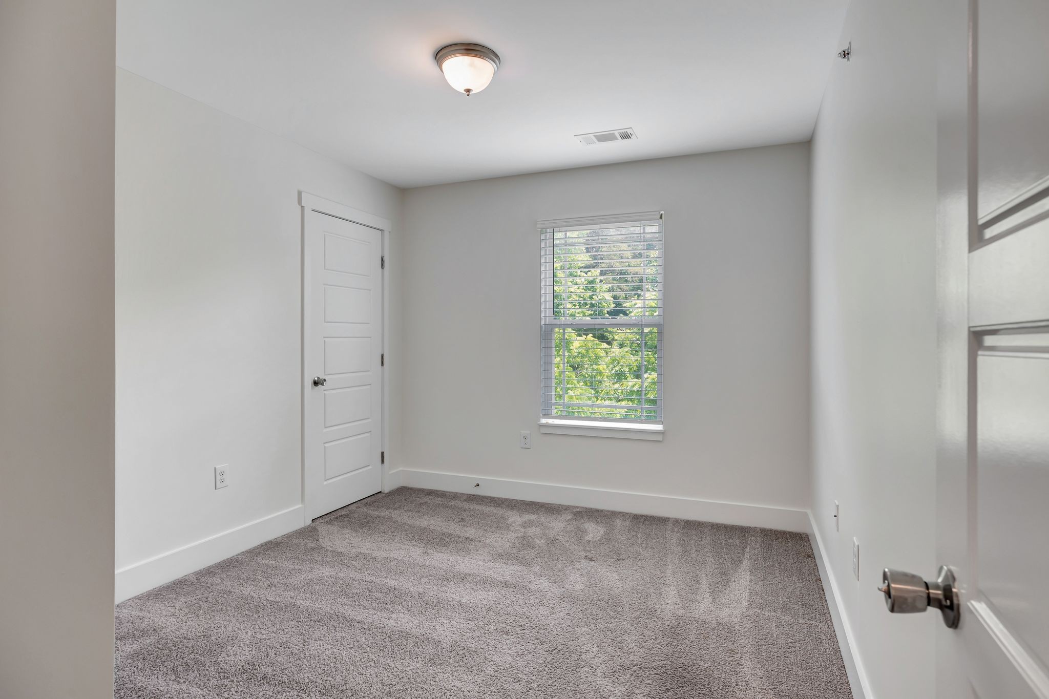 1134 Somerset Springs Drive Spring Hill, TN 37174 - Photo 22 of 28 an empty room with a window