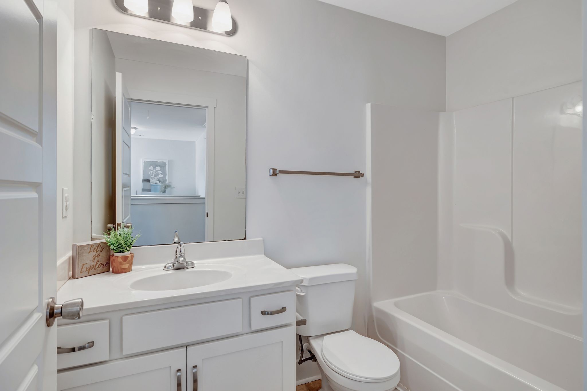 1134 Somerset Springs Drive Spring Hill, TN 37174 - Photo 23 of 28 a bathroom with a sink toilet and shower