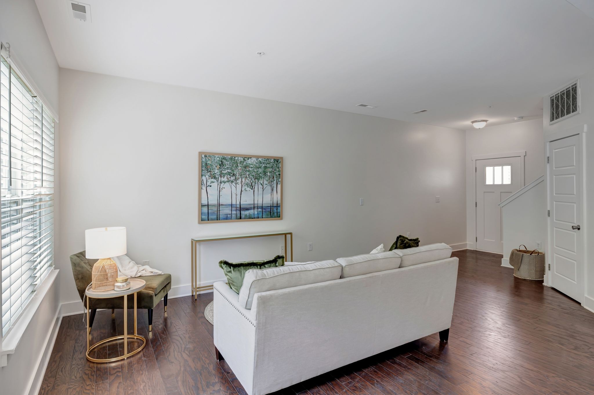 1134 Somerset Springs Drive Spring Hill, TN 37174 - Photo 6 of 28 a living room with furniture and a table