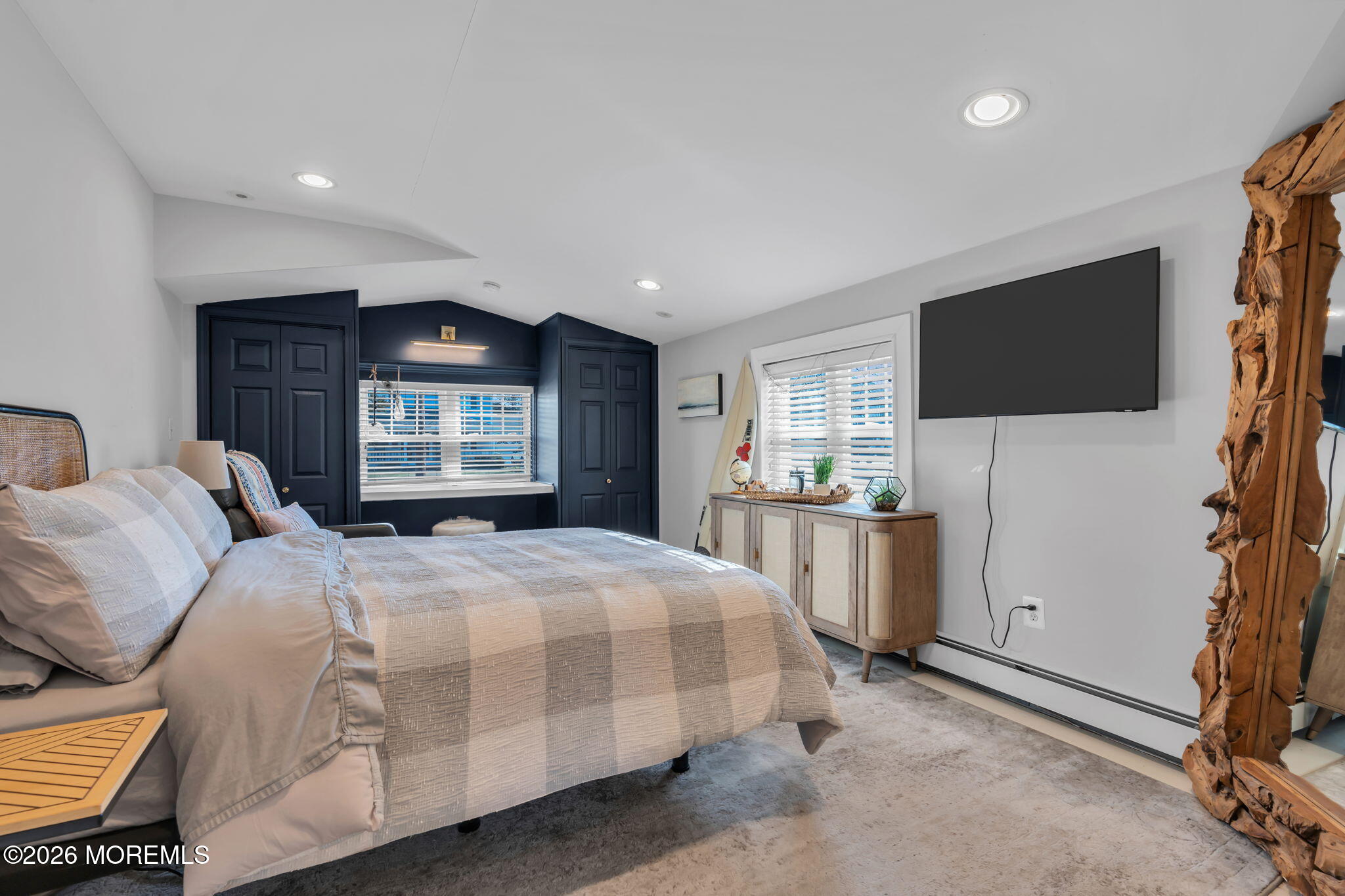 115 10th Avenue Spring Lake, NJ 07762 - Photo 2 of 30 a bedroom with a bed and a flat screen tv