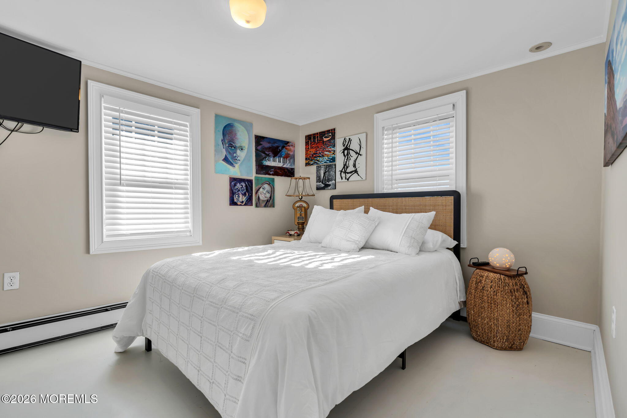 115 10th Avenue Spring Lake, NJ 07762 - Photo 25 of 30 a bedroom with a bed and a window