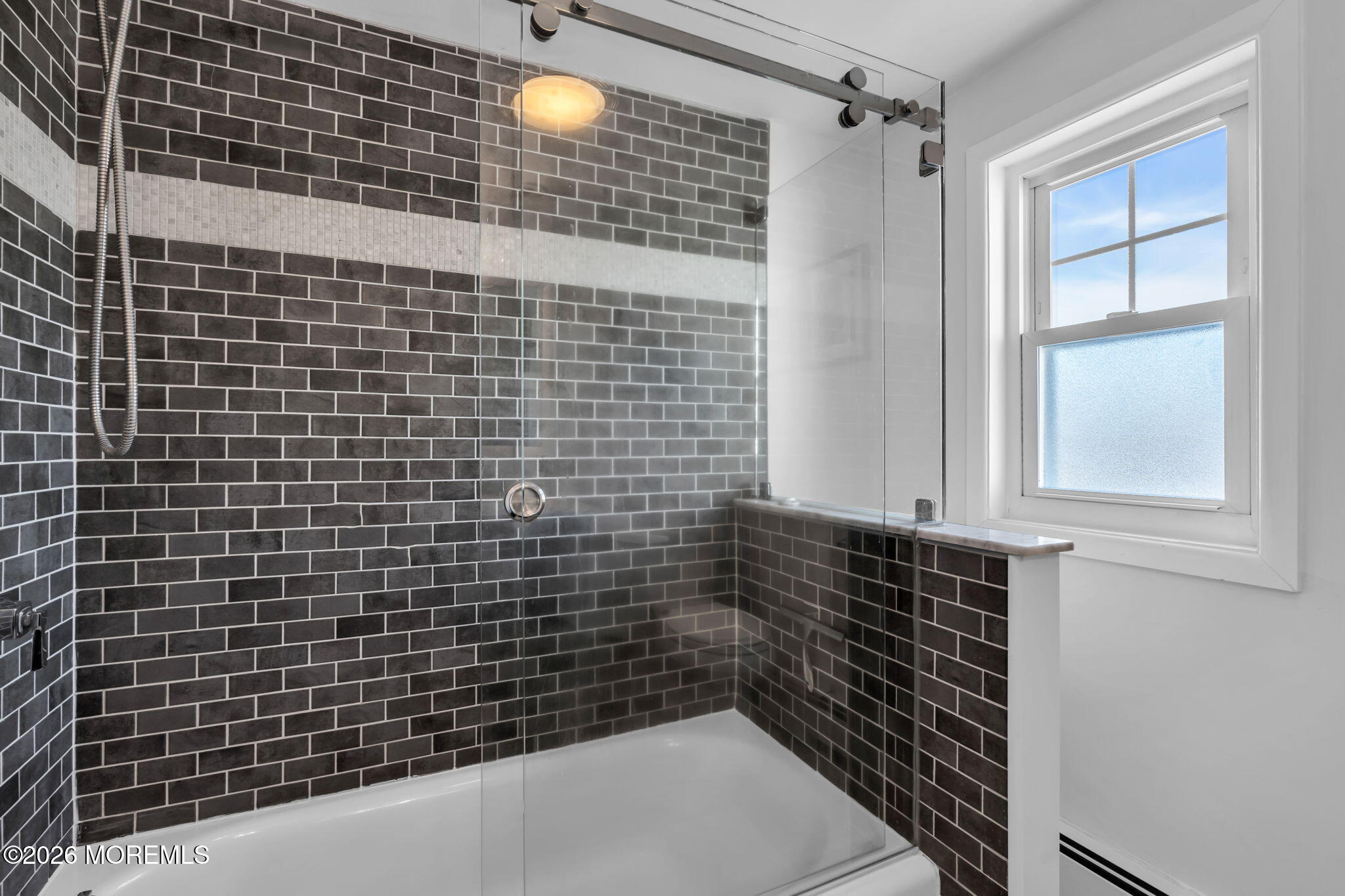 115 10th Avenue Spring Lake, NJ 07762 - Photo 27 of 30 a bathroom with a shower