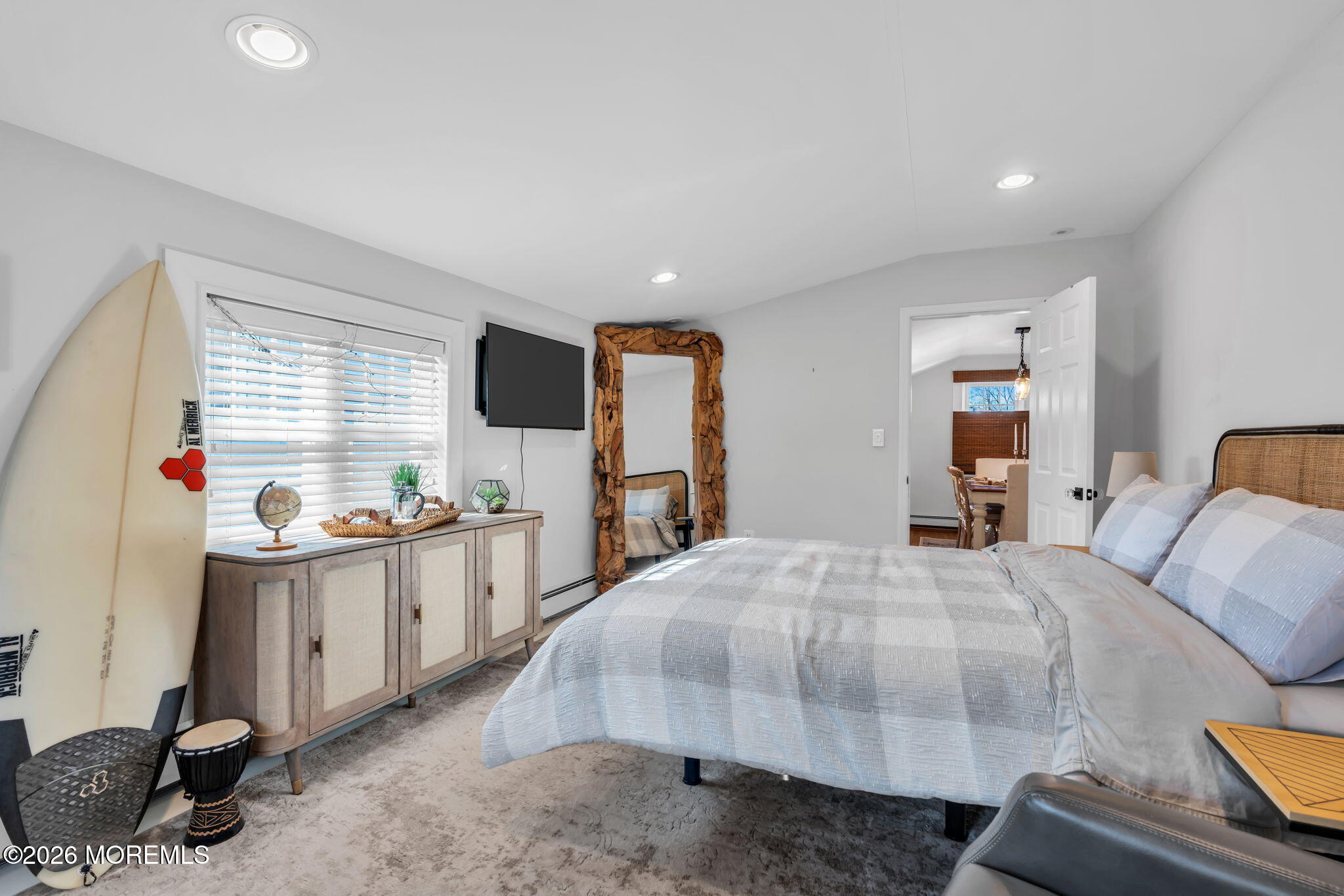 115 10th Avenue Spring Lake, NJ 07762 - Photo 3 of 30 a bedroom with a bed and a flat screen tv