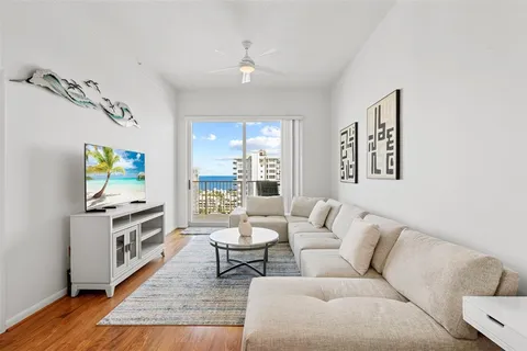 a view of a balcony with an outdoor seating space