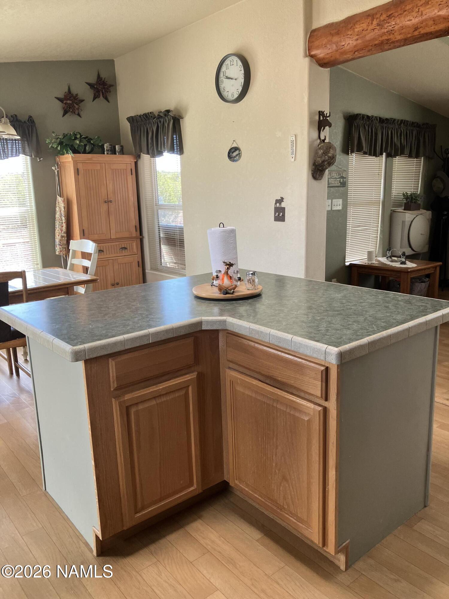 1431 East Cedar Road Williams, AZ 86046 - Photo 16 of 51 a view kitchen with granite countertop a sink a stove and cabinets