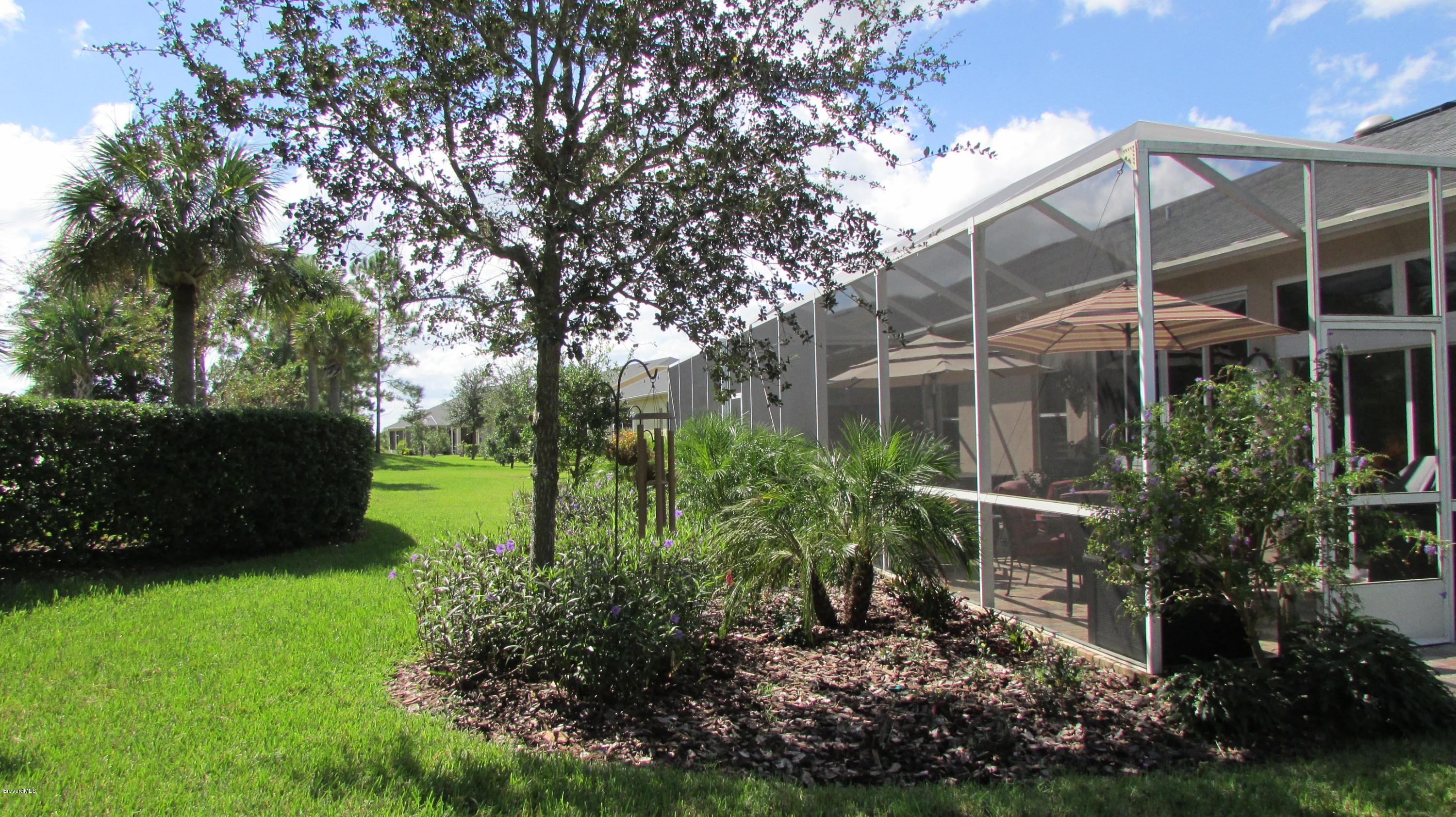 7161 Ralston Street Melbourne, FL 32940 - Photo 22 of 24 Beautiful Landscaping!