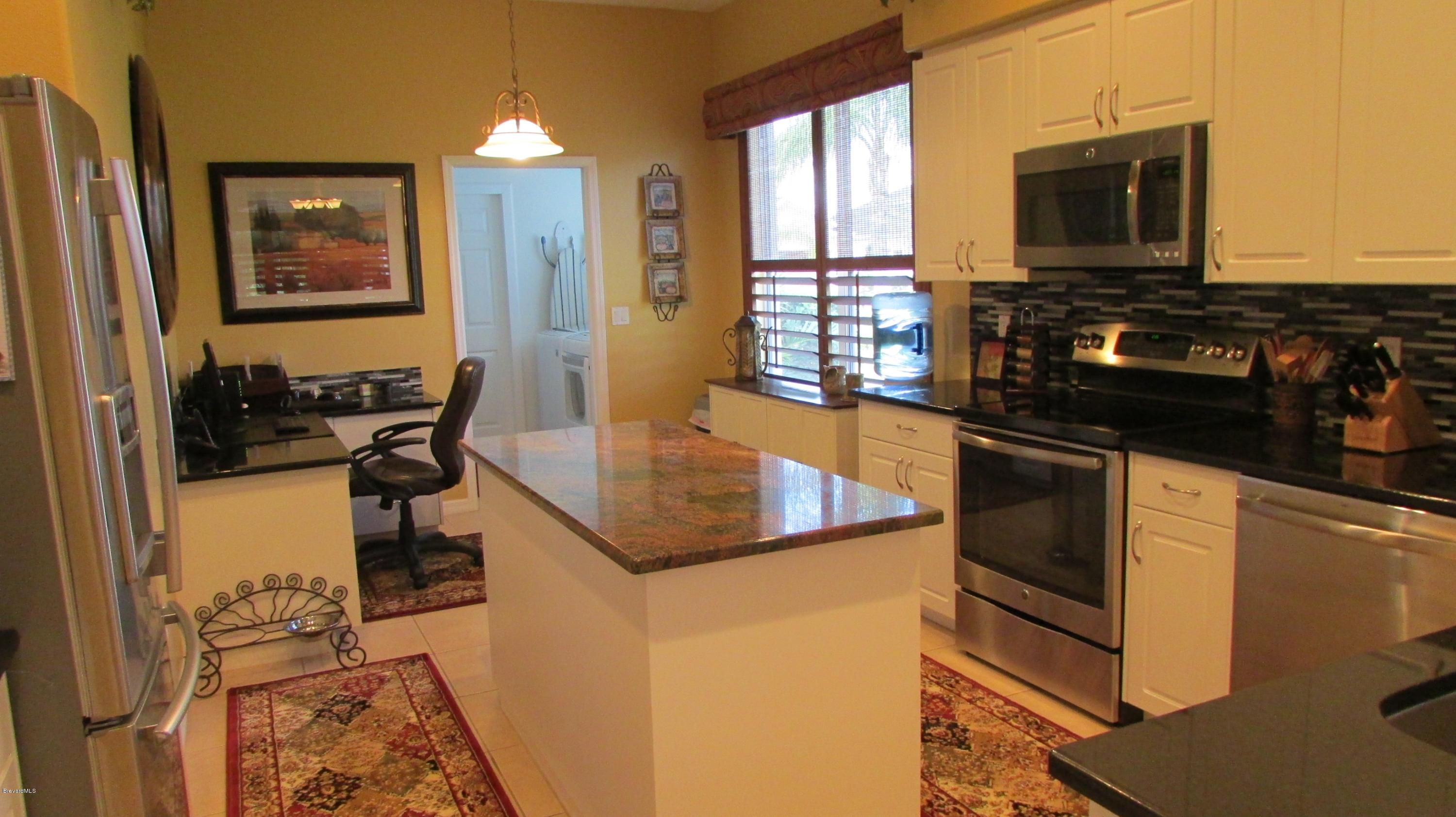 7161 Ralston Street Melbourne, FL 32940 - Photo 7 of 24 Kitchen View 1