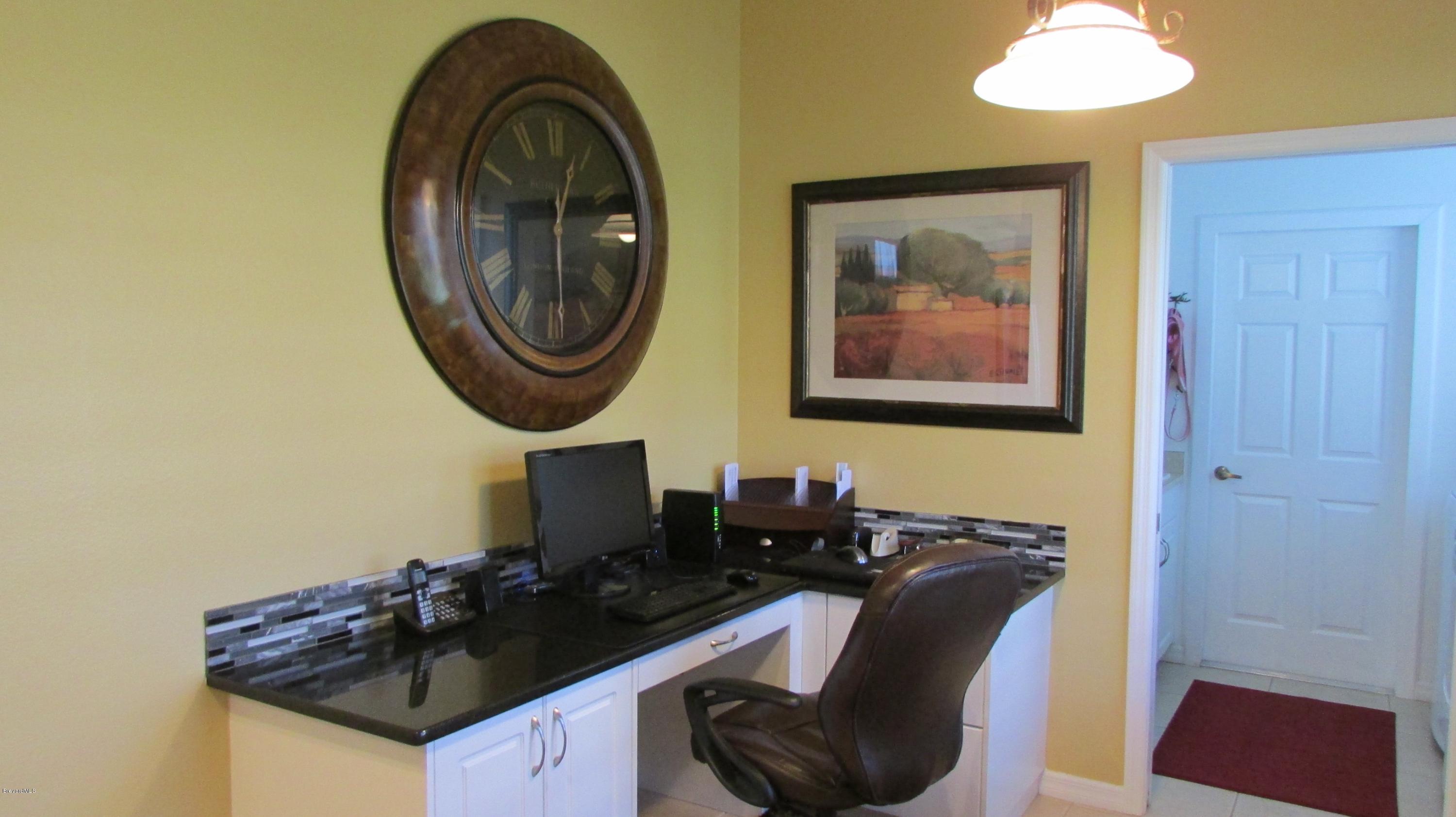 7161 Ralston Street Melbourne, FL 32940 - Photo 9 of 24 Built-in Desk