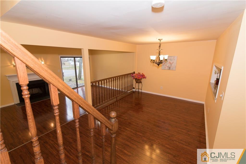 1106 Timber Oaks Road, Unit 1106 Edison, NJ 08820 - Photo 14 of 20 a view of entryway and hall with wooden floor