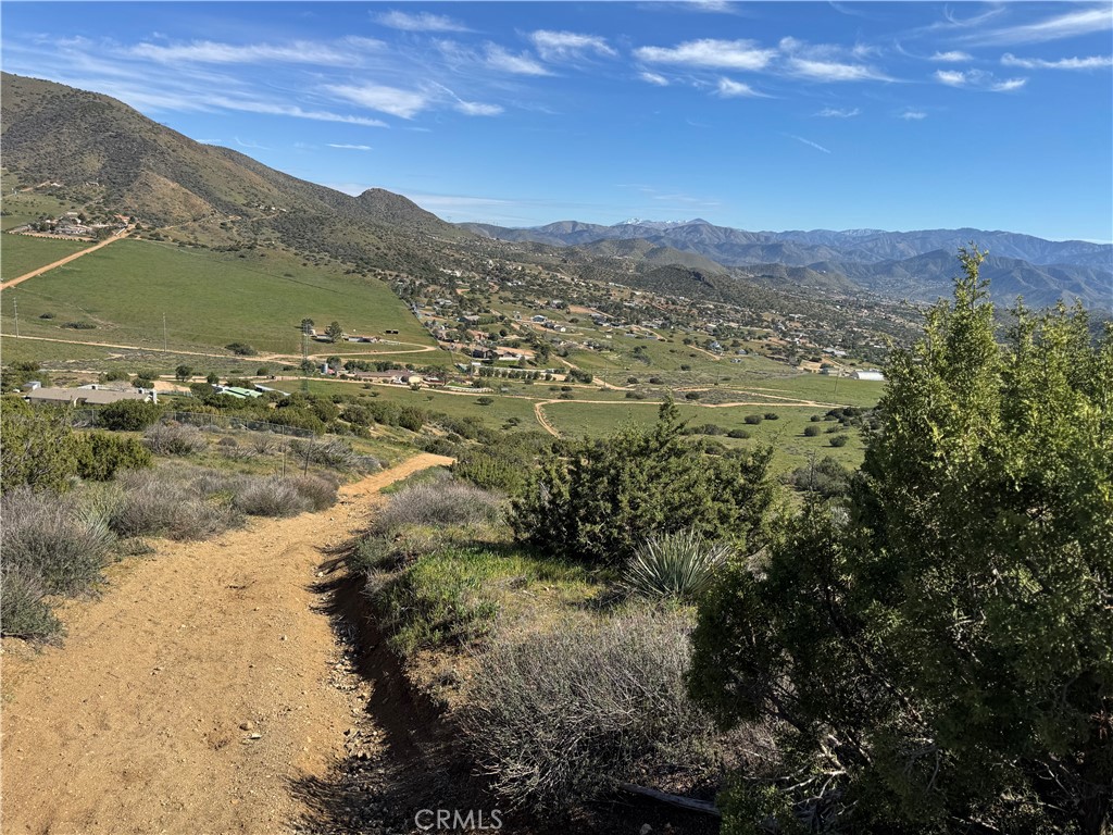 0 Th Acton, CA 93510 - Photo 1 of 3 a view of a lake with mountains in the background