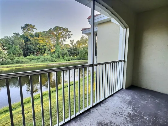 a view of a balcony with an outdoor space