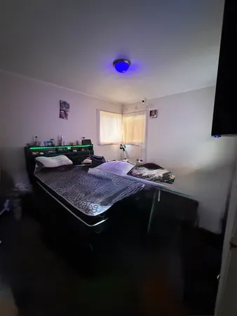 a bath room with a sink and cabinets