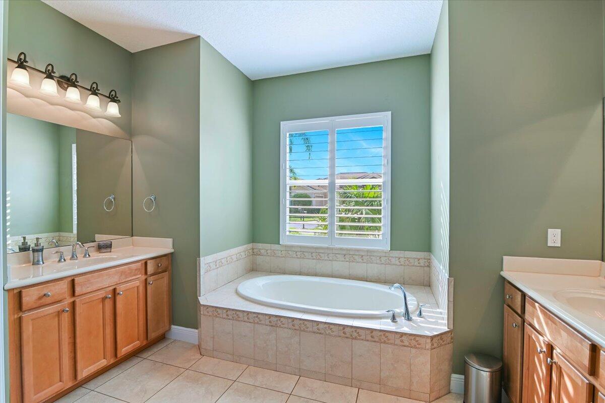 7536 Southeast Laque Circle Stuart, FL 34997 - Photo 27 of 46 Primary Bath Left