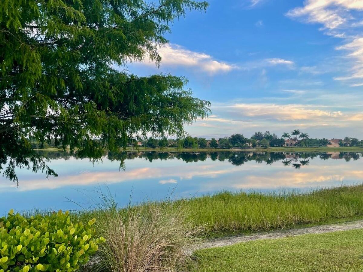 7536 Southeast Laque Circle Stuart, FL 34997 - Photo 41 of 46 Lake Walking Path
