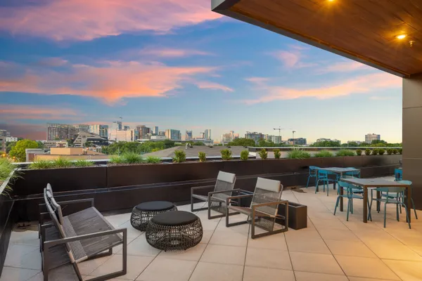 a view of a terrace with furniture