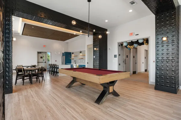 a room with furniture and wooden floor