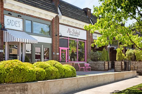 a view of a brick building with a large window