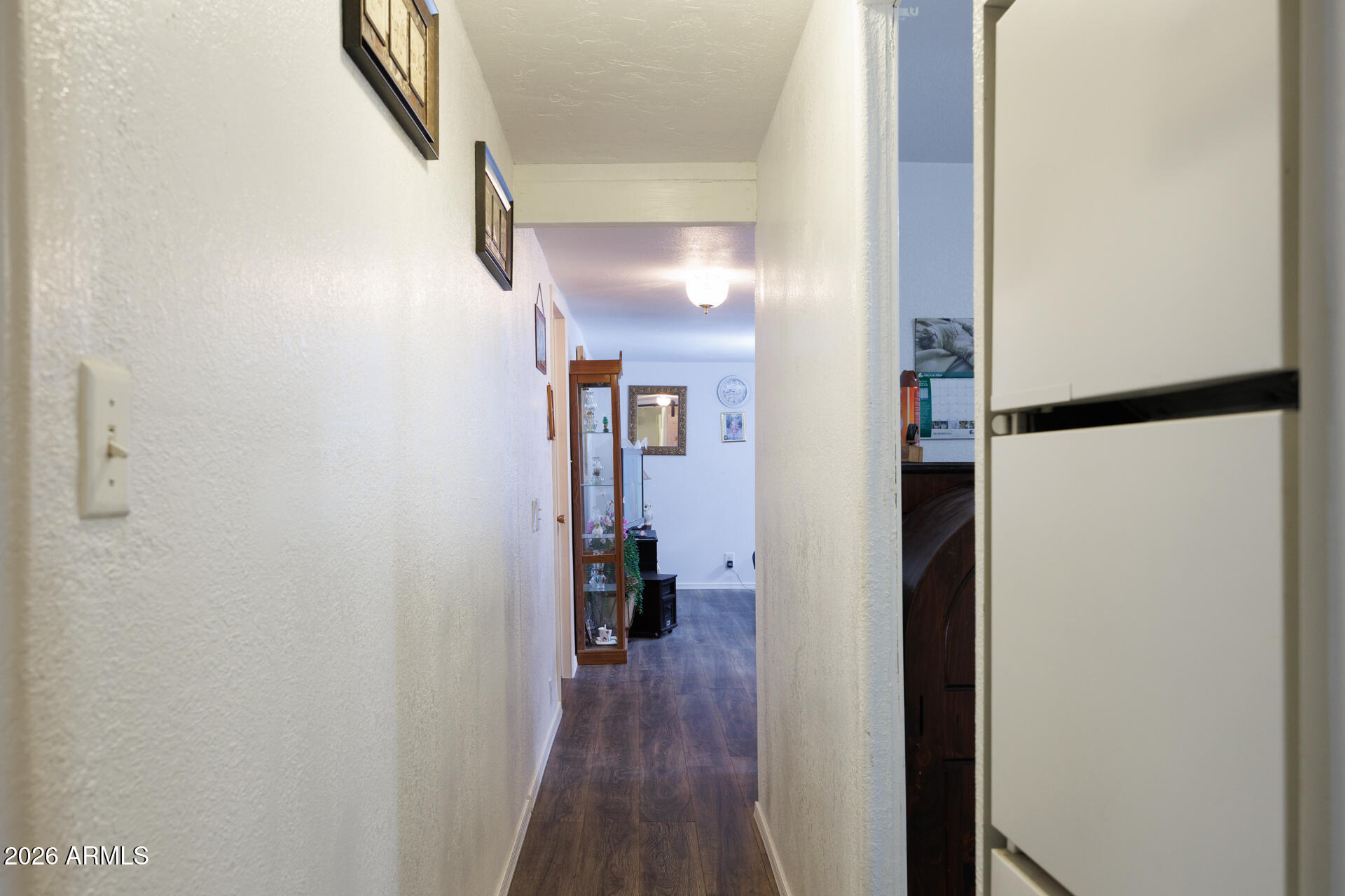 6185 East Monitor Street Picacho, AZ 85141 - Photo 32 of 55 a view of a hallway with wooden floor
