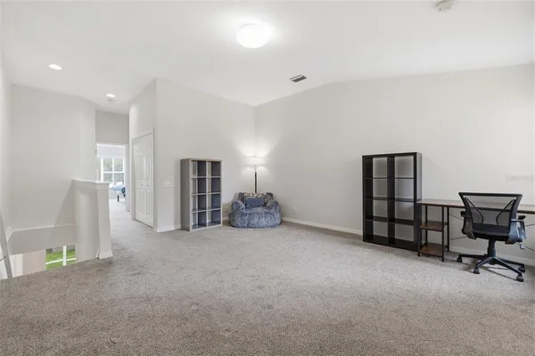 a view of a livingroom with furniture