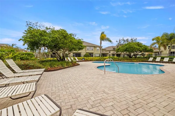 a view of outdoor space yard and swimming pool