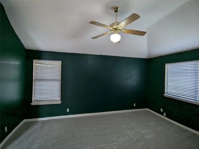 a view of a livingroom with a fan