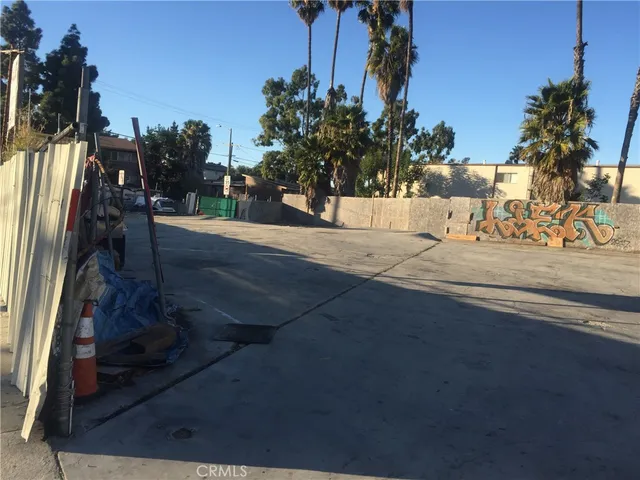 a view of a street with cars