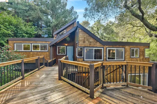 a view of a house with a roof deck