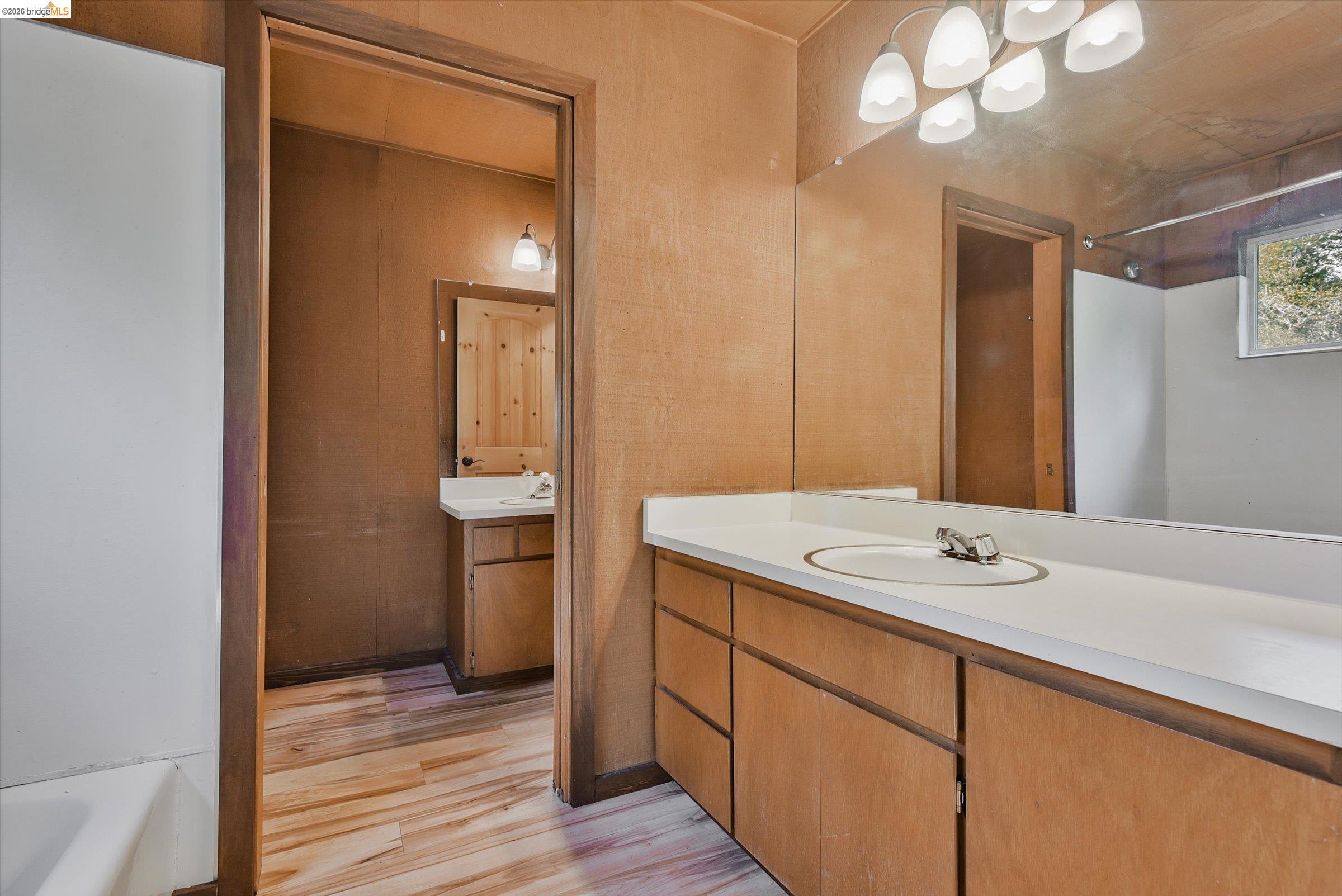 9 Wildwood Road Orinda, CA 94563 - Photo 19 of 34 a bathroom with a sink a vanity and a mirror