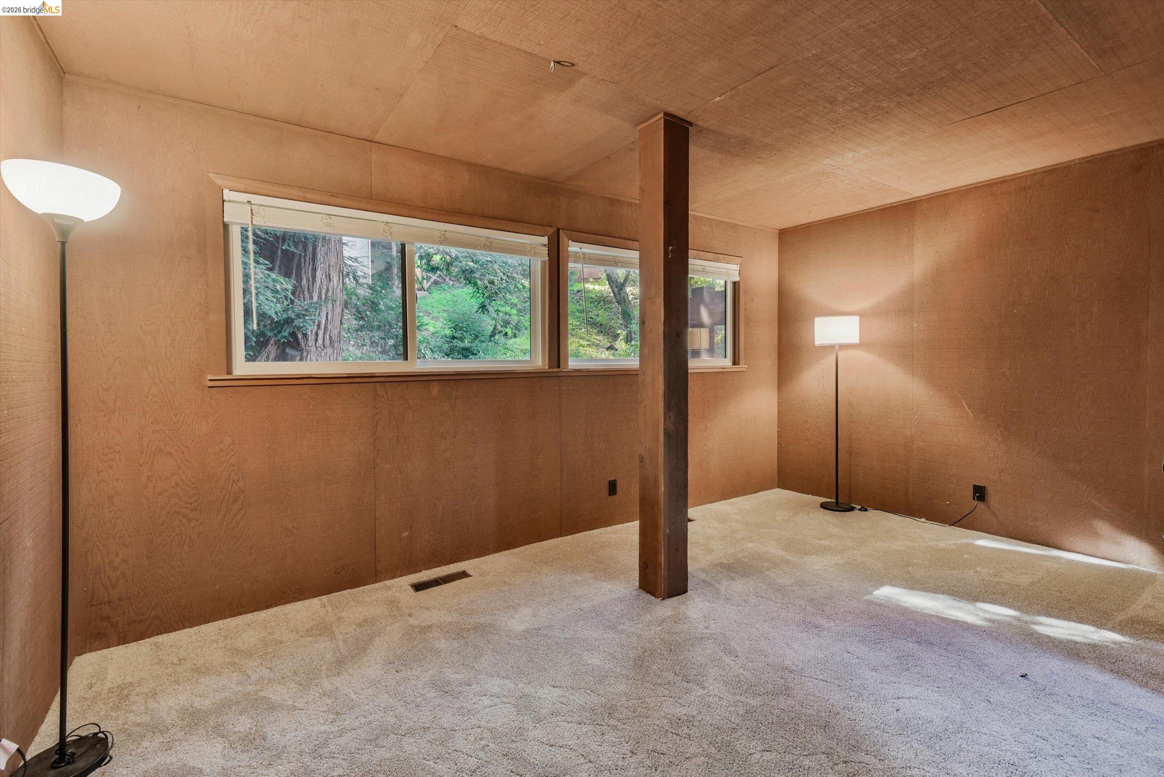 9 Wildwood Road Orinda, CA 94563 - Photo 21 of 34 a view of an empty room with a window