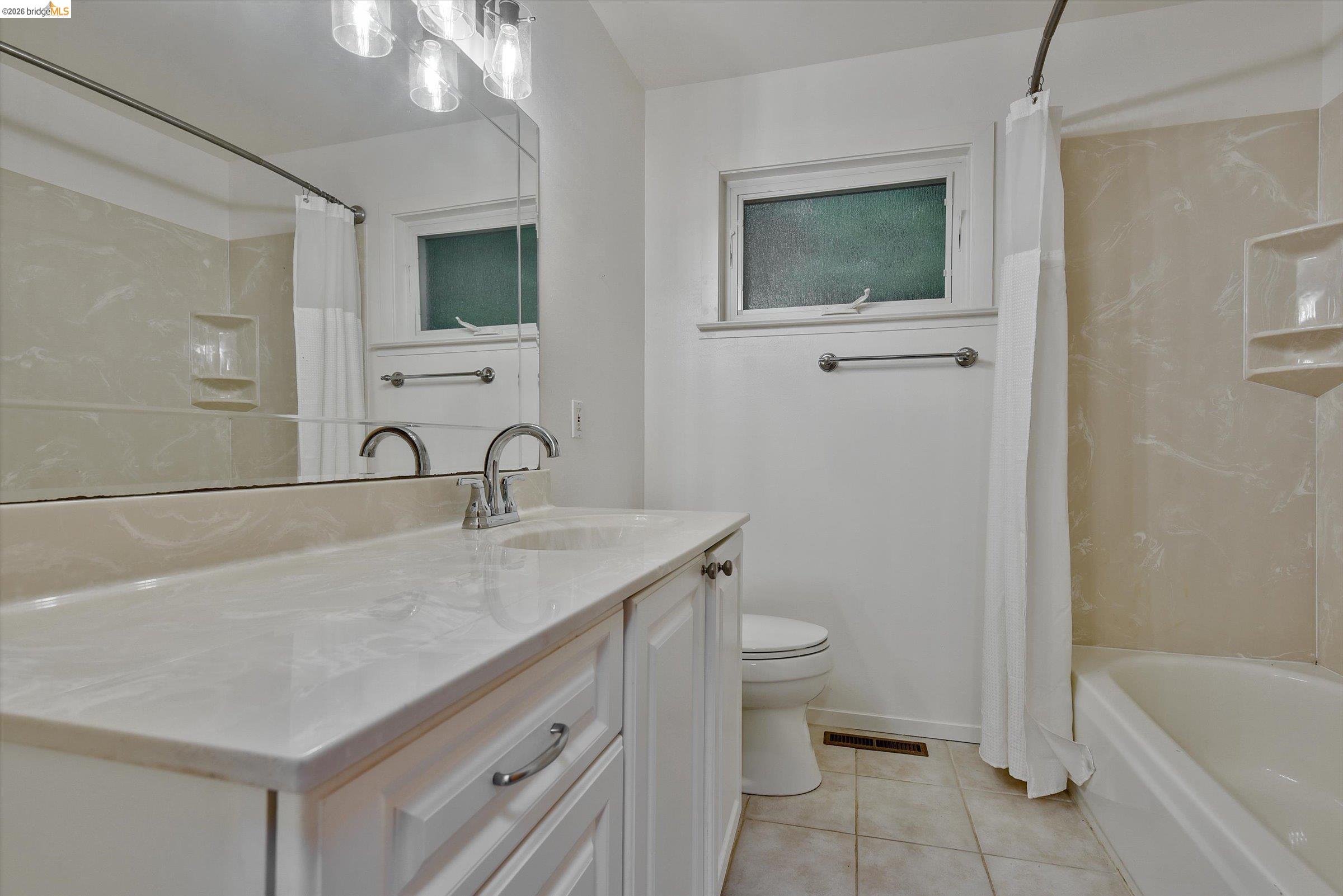 9 Wildwood Road Orinda, CA 94563 - Photo 22 of 34 a bathroom with a sink toilet and shower