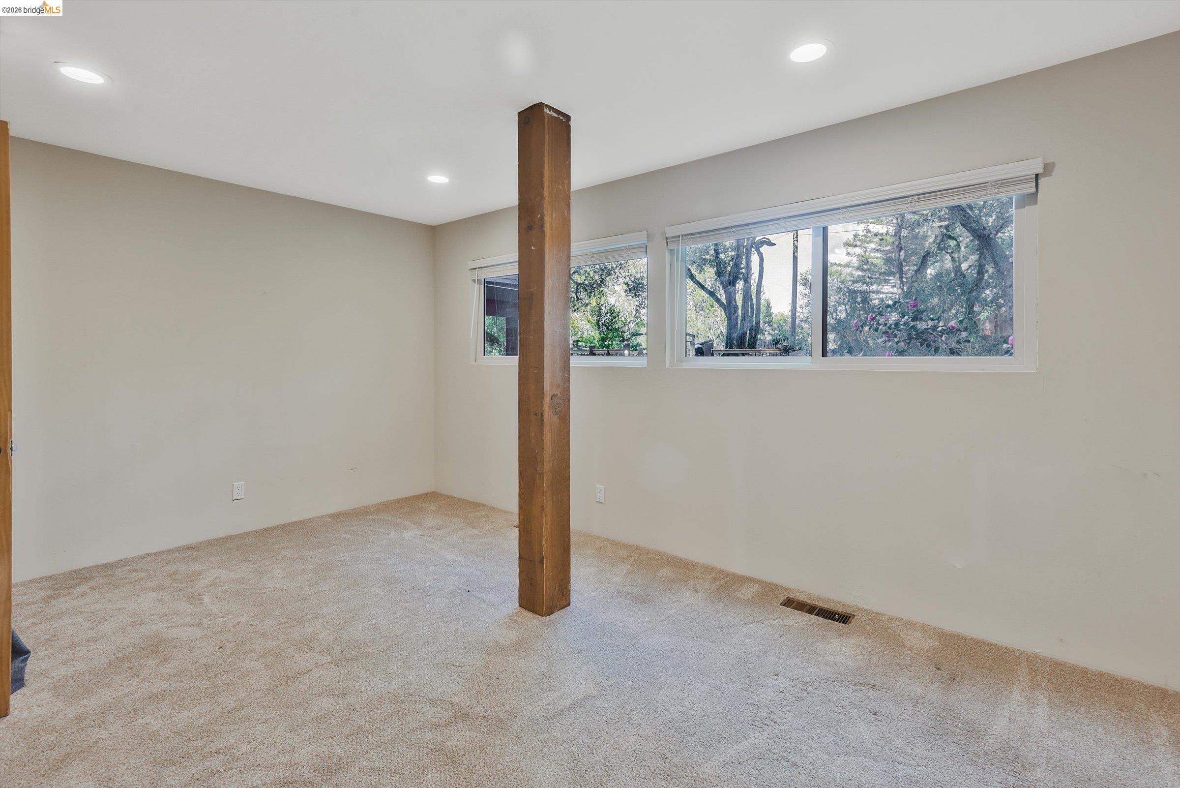 9 Wildwood Road Orinda, CA 94563 - Photo 23 of 34 a view of an empty room with a window