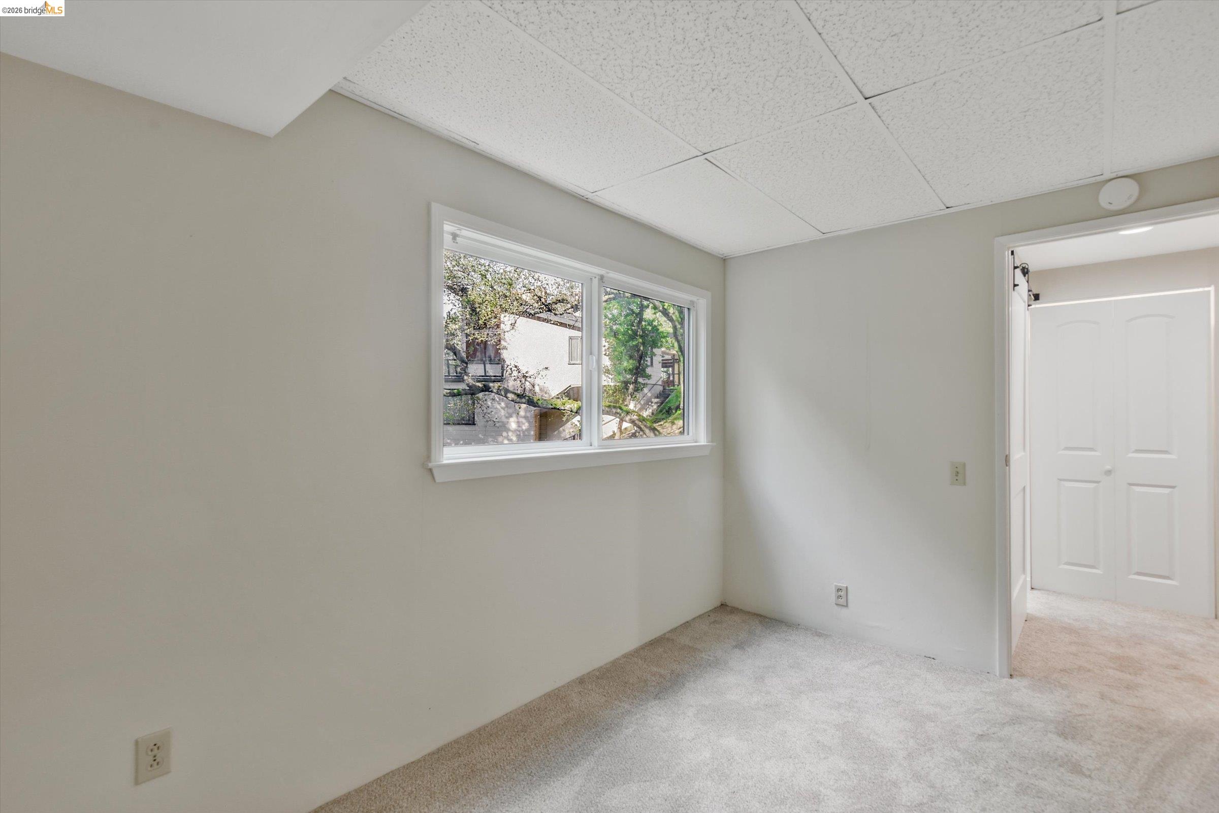 9 Wildwood Road Orinda, CA 94563 - Photo 27 of 34 an empty room with windows