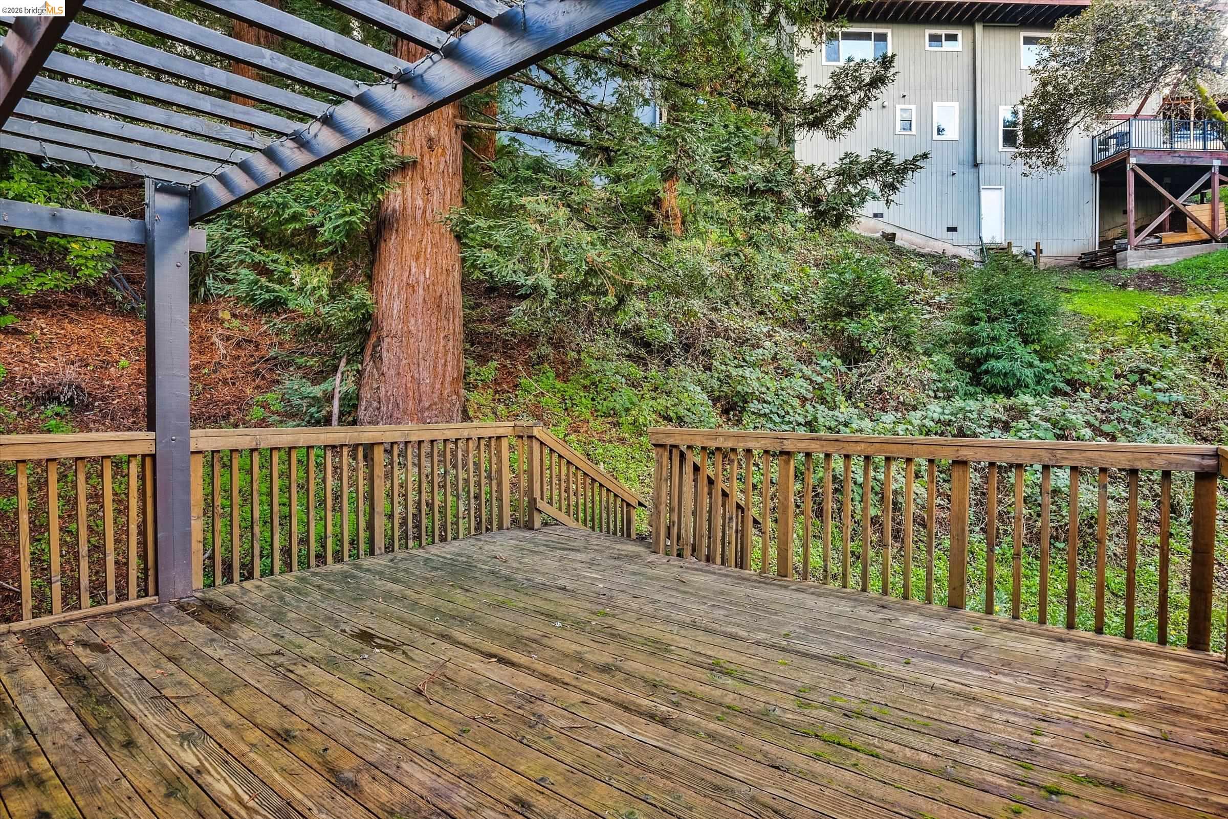 9 Wildwood Road Orinda, CA 94563 - Photo 29 of 34 a balcony with wooden floor and outdoor space
