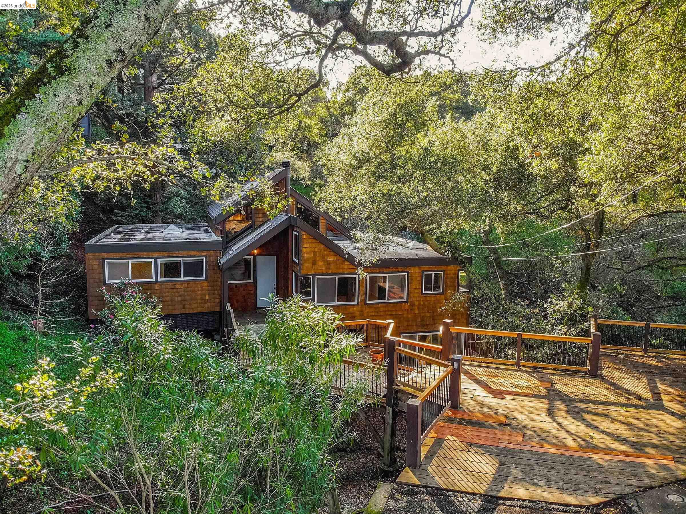 9 Wildwood Road Orinda, CA 94563 - Photo 30 of 34 a view of a house with a yard
