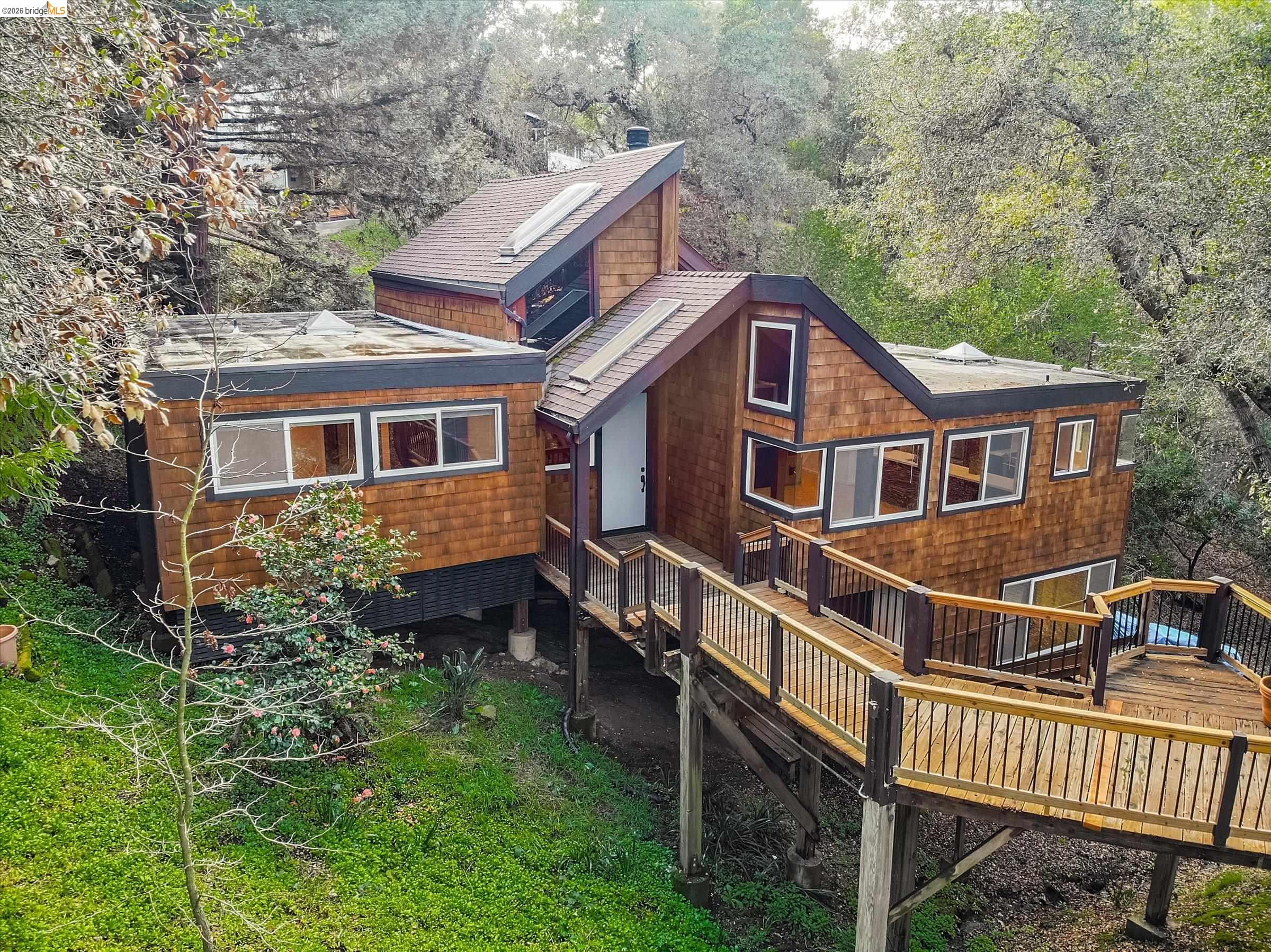9 Wildwood Road Orinda, CA 94563 - Photo 32 of 34 a view of a house with wooden fence