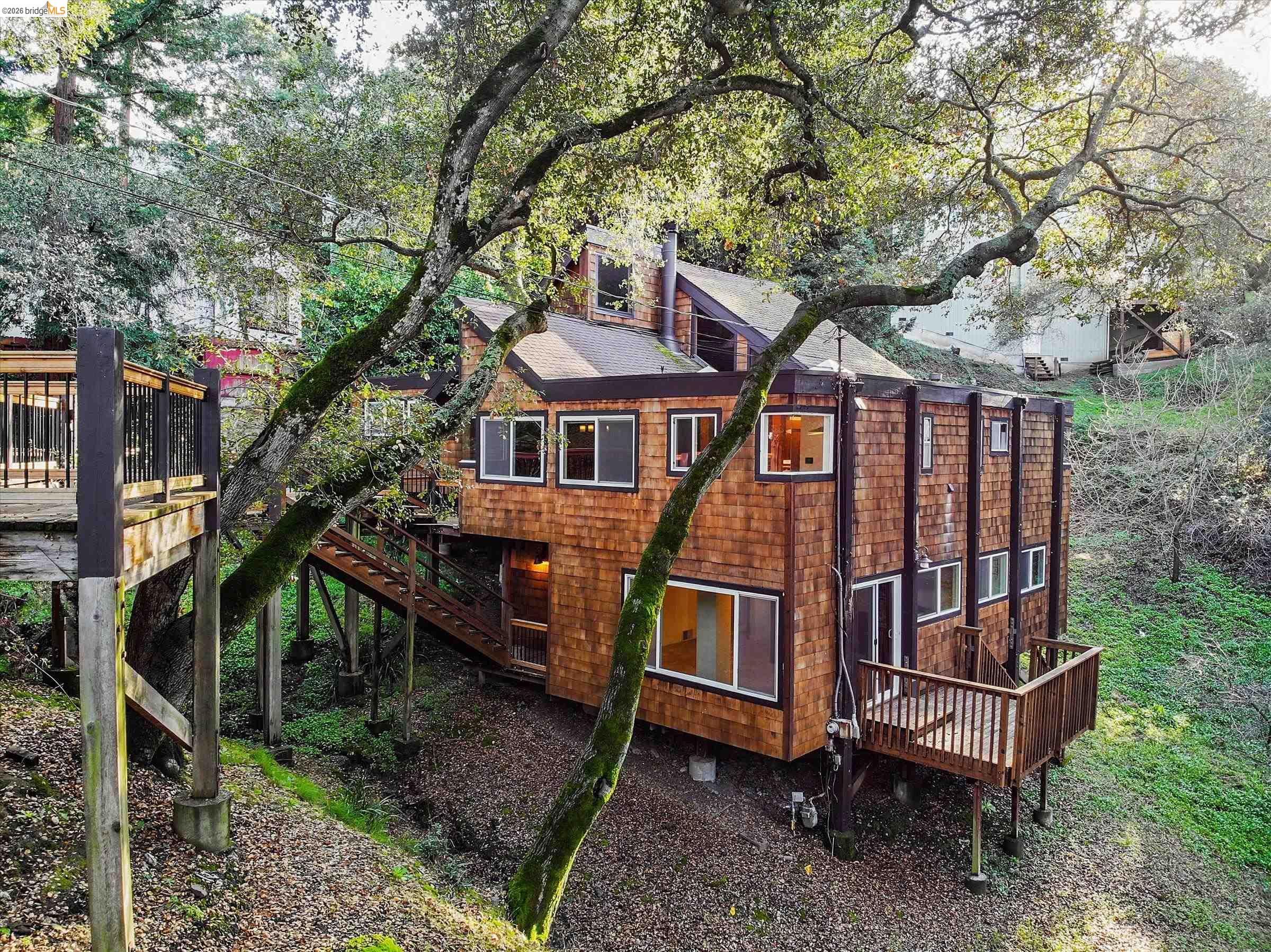 9 Wildwood Road Orinda, CA 94563 - Photo 34 of 34 a view of a house with a yard deck and furniture