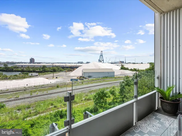 a bathroom with a sink toilet and mirror