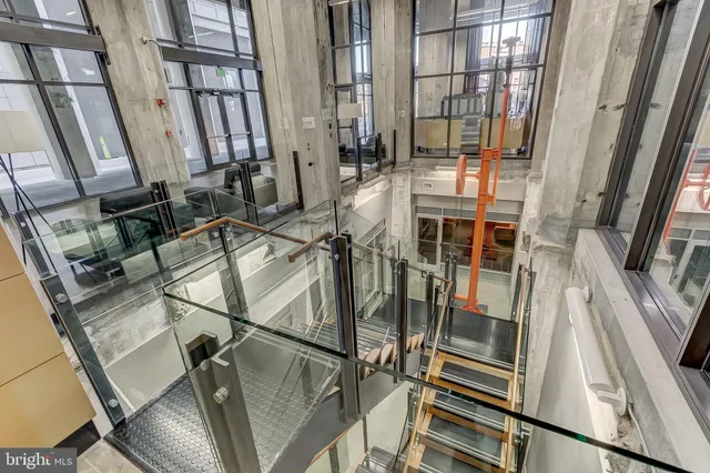 a view of outdoor space with signage and flags