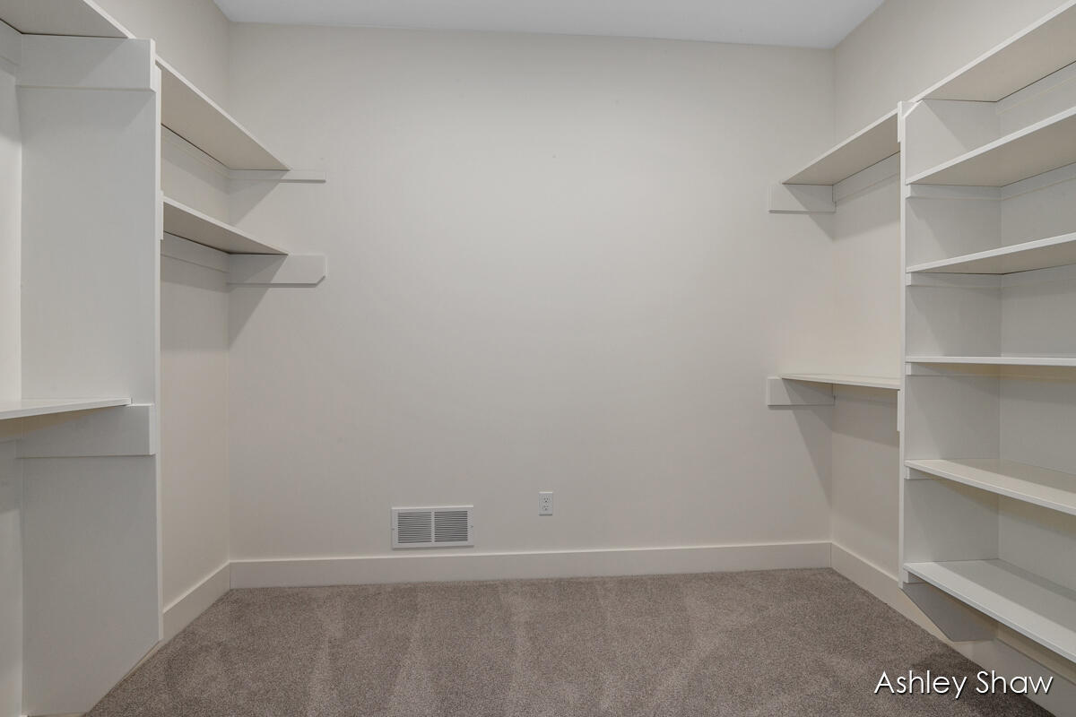 1468 Maplewood Drive, Unit 9 Jenison, MI 49428 - Photo 10 of 13 Primary Closet