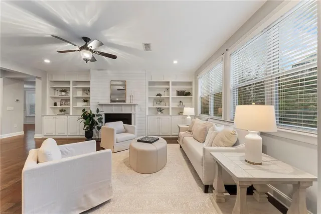a kitchen with a refrigerator and cabinets