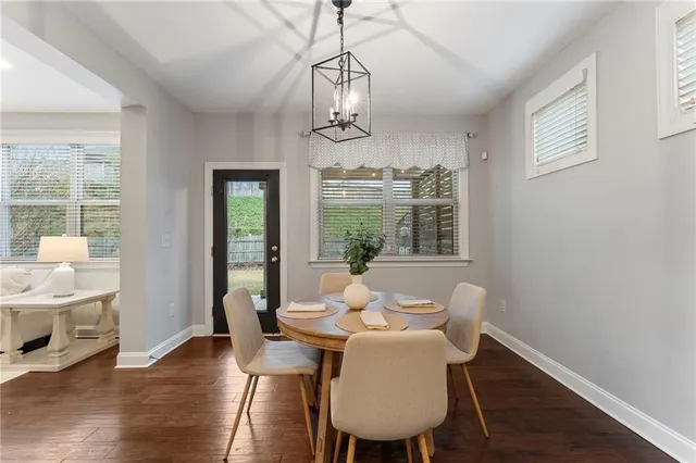 a bed room with furniture and a window