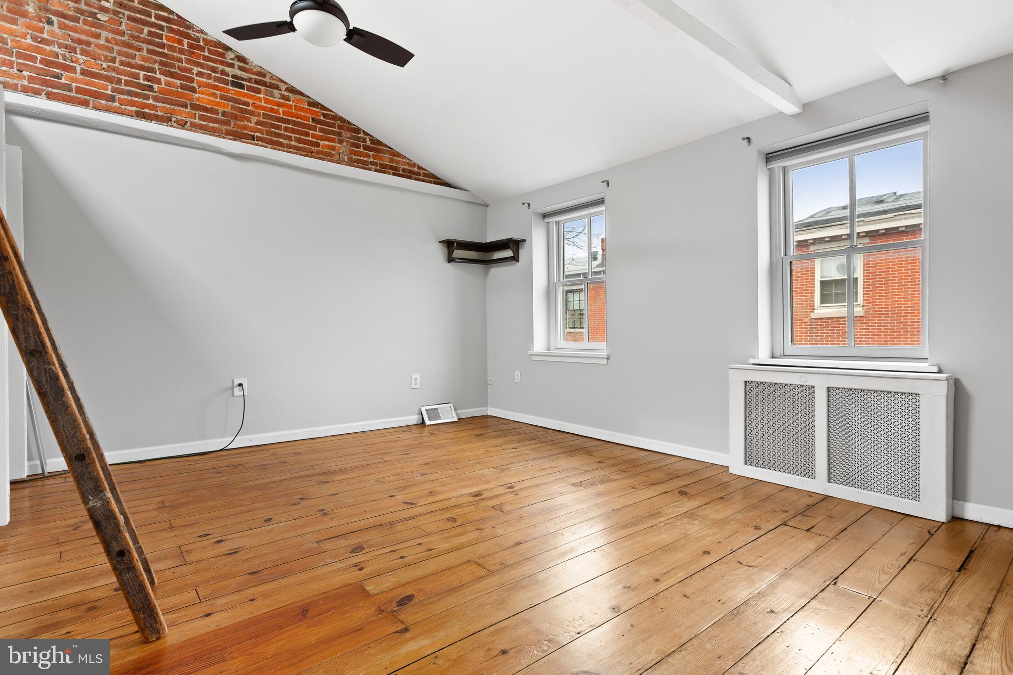 504 Kauffman Street Philadelphia, PA 19147 - Photo 16 of 34 a view of an empty room with a window
