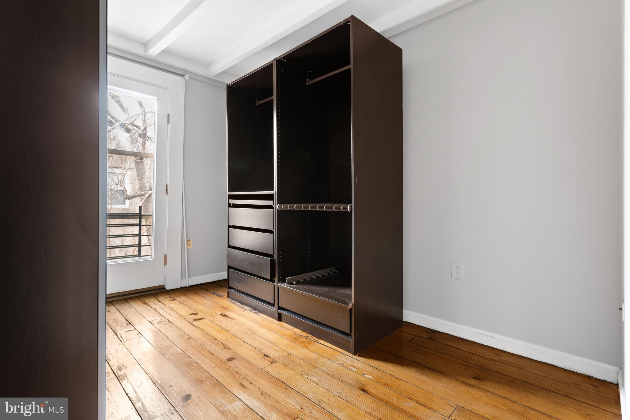 504 Kauffman Street Philadelphia, PA 19147 - Photo 20 of 34 an empty room with wooden floor and closet