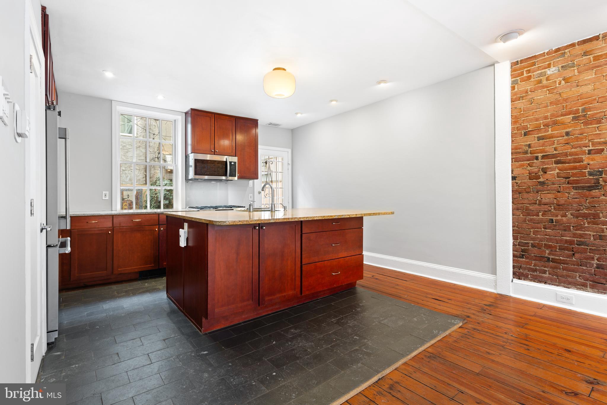 504 Kauffman Street Philadelphia, PA 19147 - Photo 7 of 34 a room with a sink and a mirror