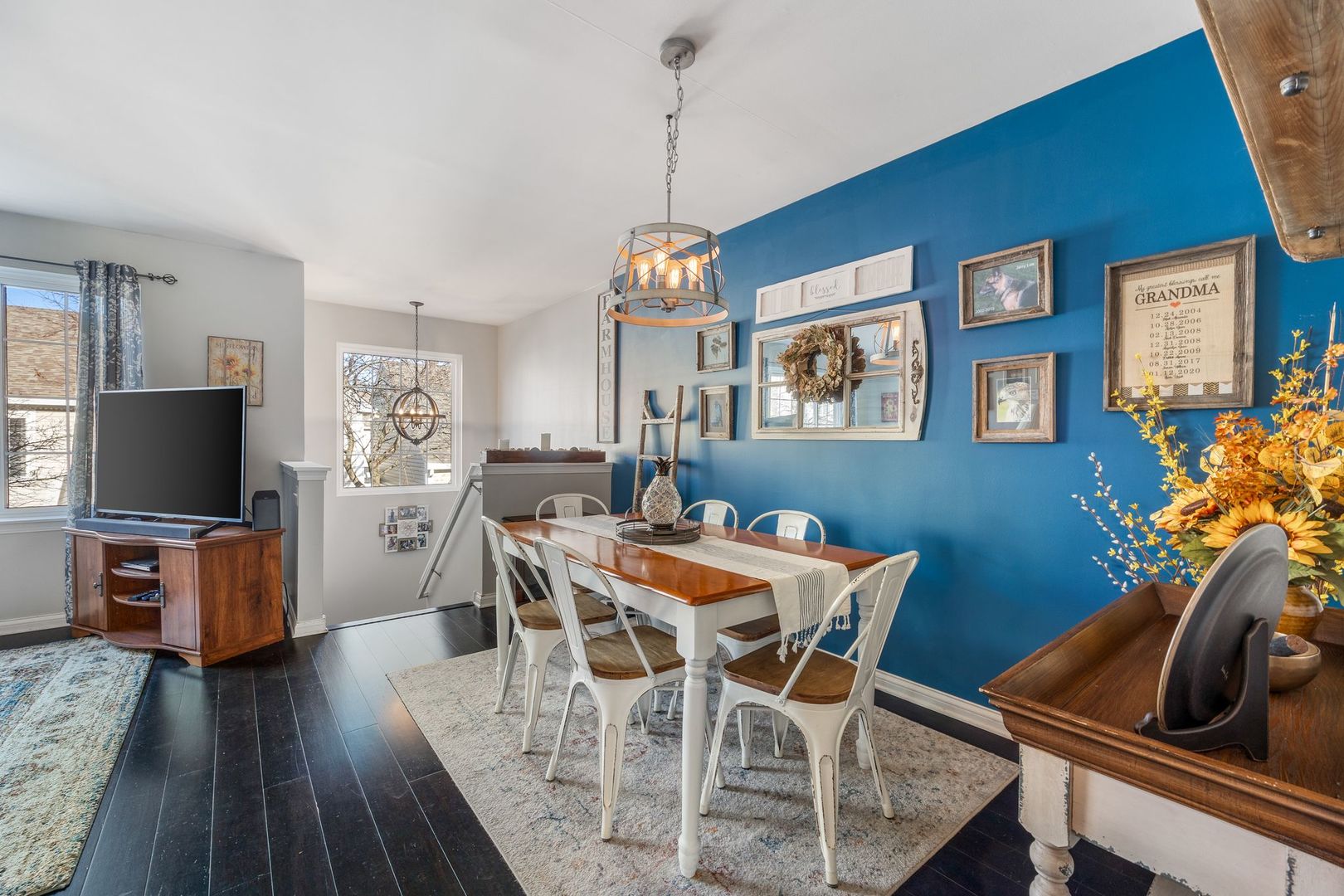 346 Springmist Court Bolingbrook, IL 60440 - Photo 6 of 19 a view of a dining room with furniture wooden floor and a rug