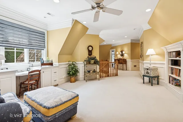 a view of a kitchen with stainless steel appliances granite countertop a stove a sink and a microwave