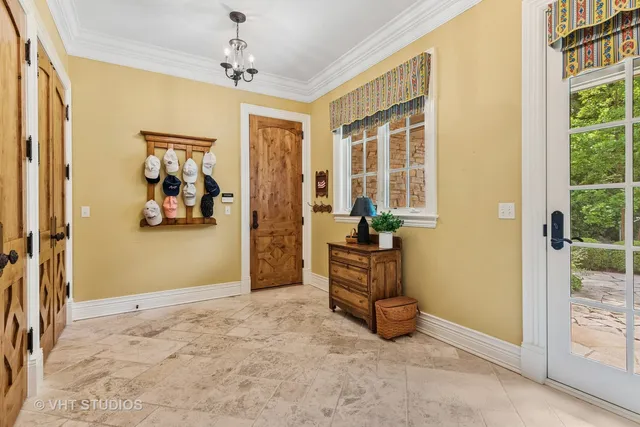 a living room with furniture ceiling fan and a fireplace