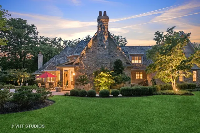 a view of a house with a street