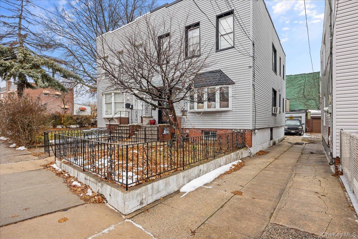 2953 Harding Avenue Bronx, NY 10465 - Photo 24 of 29 View of front of property featuring a fenced front yard