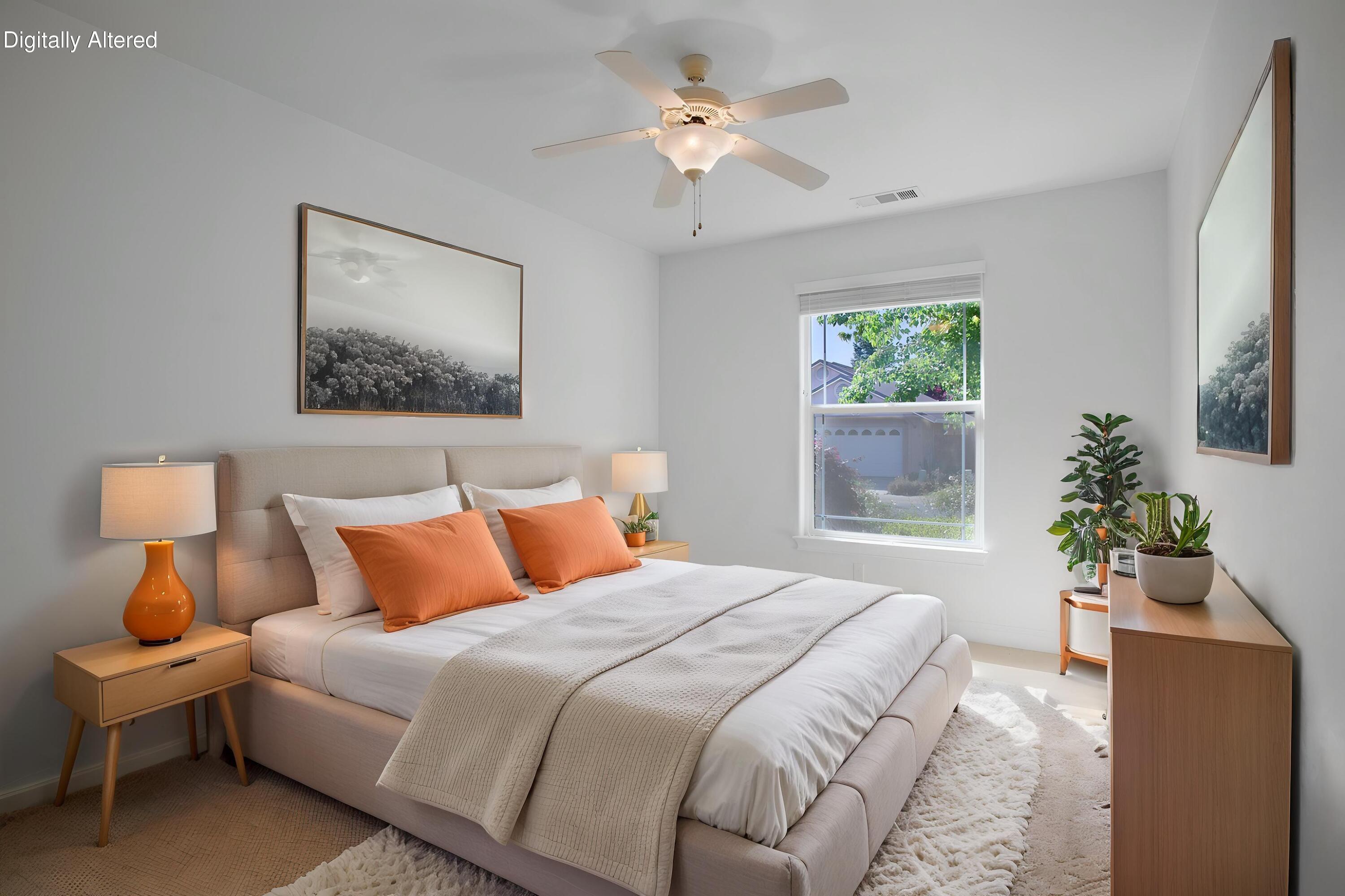 655 Mammoth Path Redding, CA 96003 - Photo 19 of 38 a bedroom with furniture and a large window